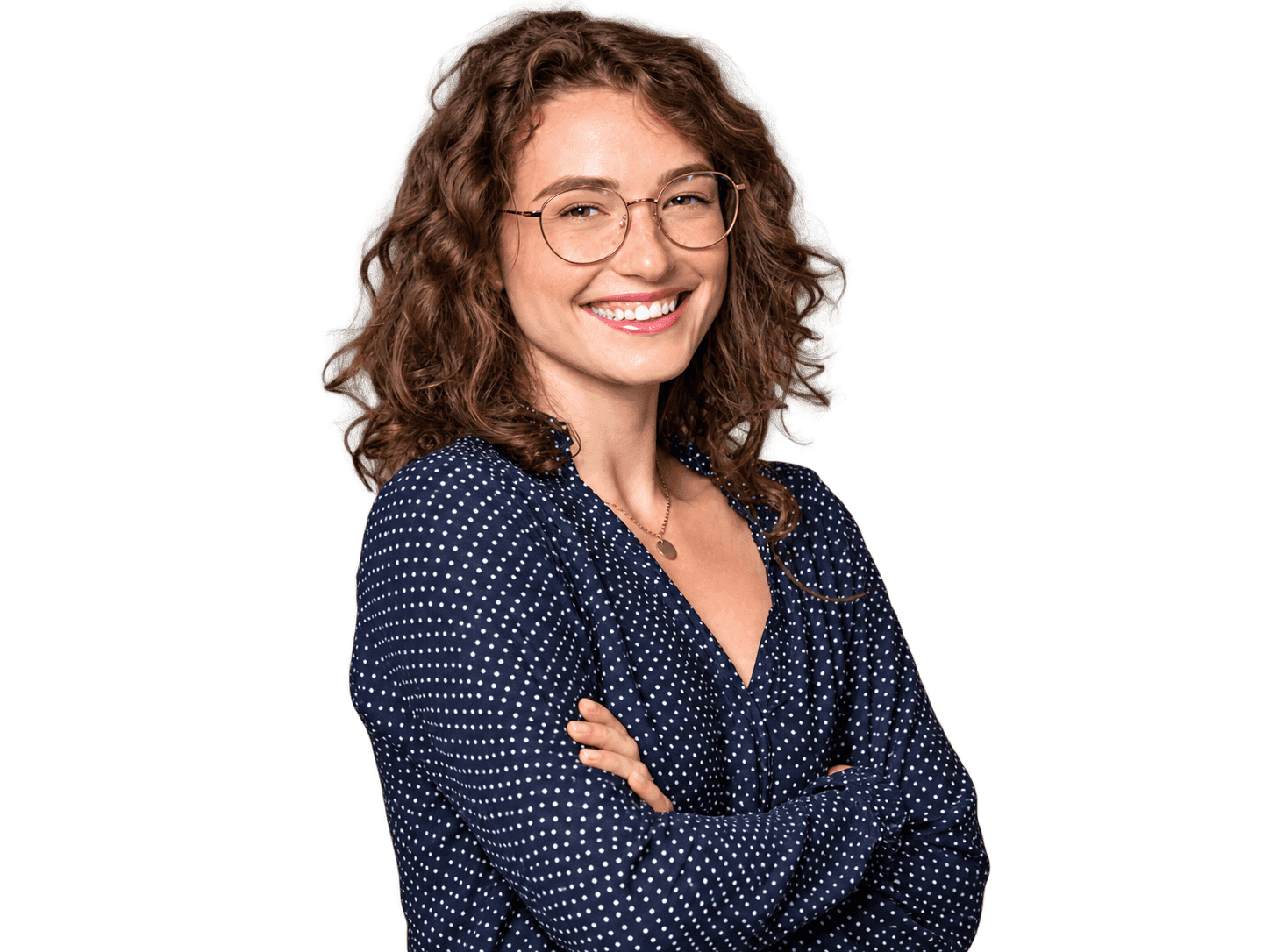 Small-business owner wearing glasses and a polka-dot shirt, arms crossed